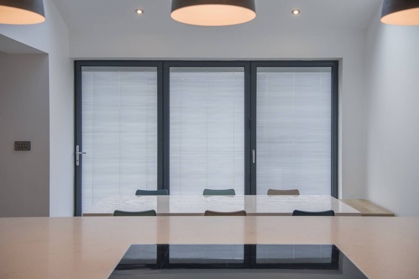 Integral blinds in bi-folding doors