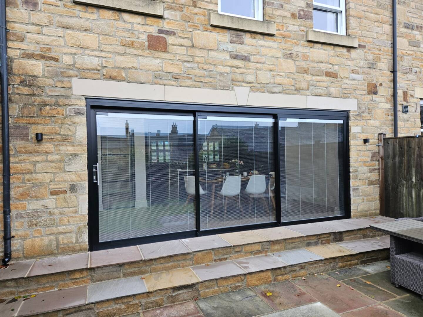 Aluminium triple track sliding patio door in Black